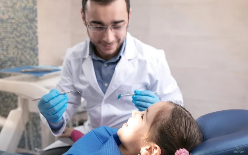 Harsh overhead fluorescent lighting in a healthcare exam room