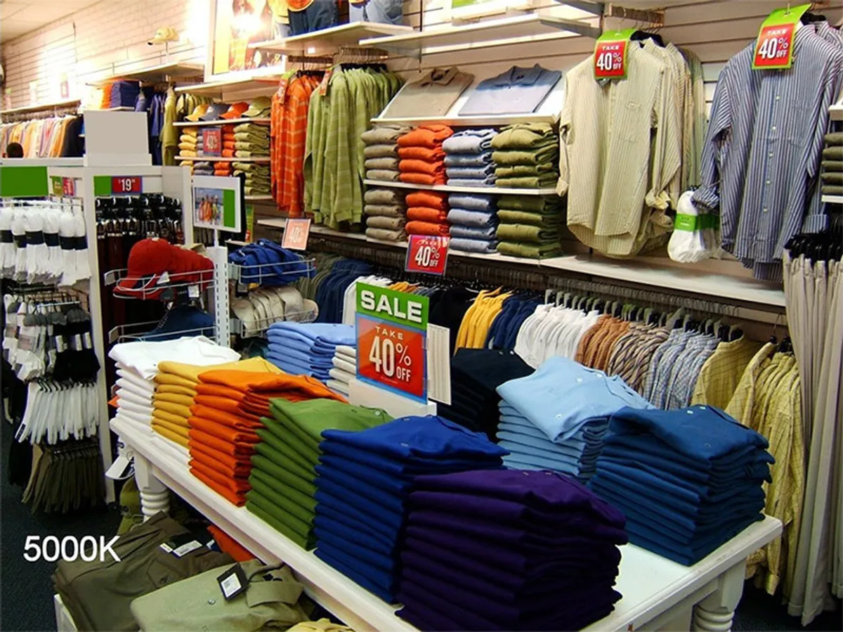 Same retail store under full-spectrum lighting with accurate, natural color rendering